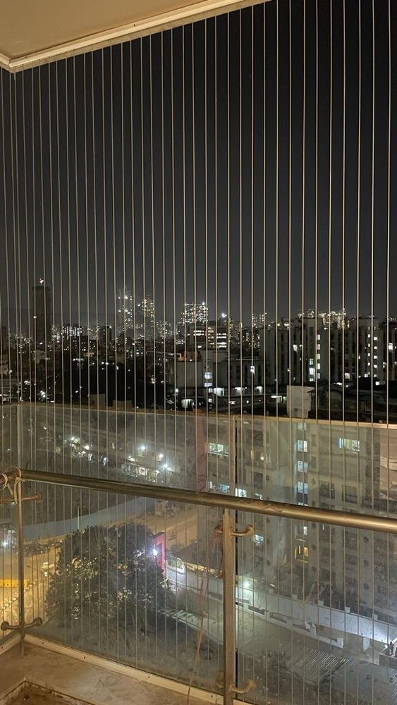 Invisible grill installation on Chennai balcony
